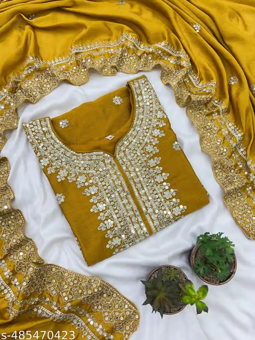 Women’s mustard yellow embroidered sharara suit set fabric detail